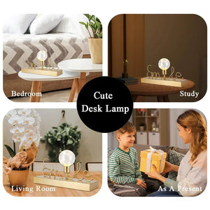Decorative cordless desk lamp with warm white fairy lights and a gold finish.