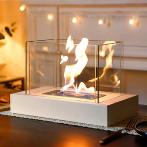 360° Rectangular tabletop fire bowl with four-sided glass enclosure and visible flames on a white base