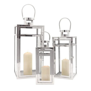 Set of 3 stainless steel candle lanterns with clear glass panels in 19in, 15in and 12in heights by JHY DESIGN