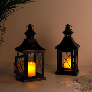 11'' high metal decorative candle lanterns, set of 2, black with glass panels and lit candles