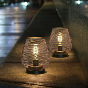 6.7-inch tall battery-powered outdoor table lamp by JHY DESIGN; copper mesh lanterns with warm glow, set of 3