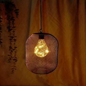 Battery-operated hanging mesh lantern lamp, 8.5in tall, dark metal cage with warm LED bulb.