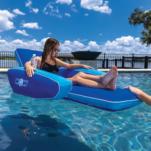 WOW Modern Lounger pool float in blue with cupholder, person relaxing in pool.
