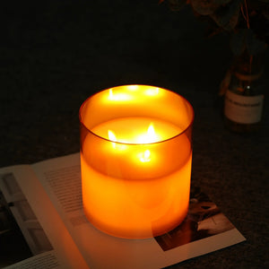 6-inch high amber glass flameless candle with 3 wicks, battery-operated