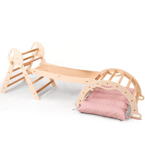 Wooden 4in1 Montessori climbing set with Pikler triangle, arch, slide board, and pink star-print cushion.