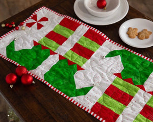Quilt Kit Elf Feet Christmas Table Runner, precut blocks in red, green, and white.