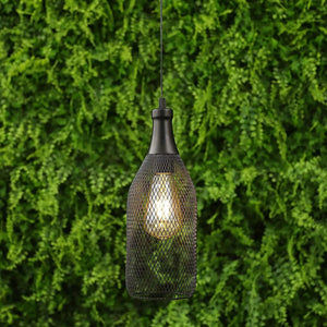 Battery powered hanging pendant lamp with black metal mesh shade and warm Edison bulb.