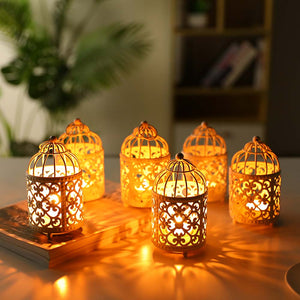 6-pack small gold-tone metal candle lanterns by JHY DESIGN with intricate filigree and warm glow