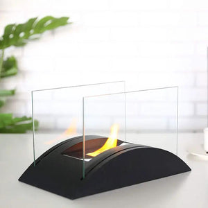13.5in rectangular tabletop fireplace with a black curved base and two clear glass panels around the flame.