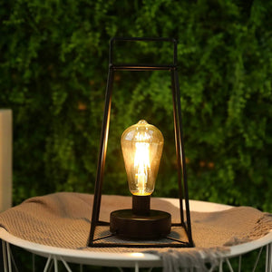 12''H Retro Style Geometric Table Lamp by JHY DESIGN, black metal frame with exposed Edison bulb on outdoor table