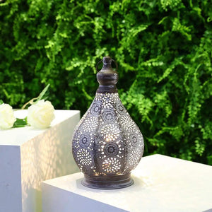 11.5-inch battery-powered table lamp by JHY DESIGN with ornate dark-metal perforated lantern.
