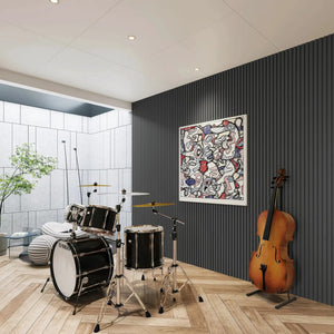 Acoustical 100% polyester wall panel by HAUSVITA; black vertical slat wall in a music room