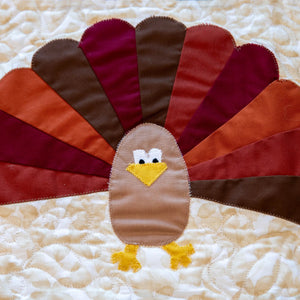 Turkey Thanksgiving table runner precut quilt kit with backing in autumn browns, oranges, and yellows