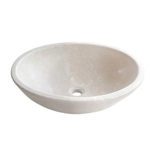 Oval Botticino marble above-vanity vessel sink, natural stone with subtle veining, honed finish