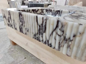 Calacatta Viola marble wall-mount vessel sink with ribbed textured front by Villohome