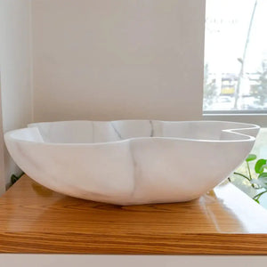 Bathroom vessel sink in Carrara white marble by Villohome, polished, on wood vanity