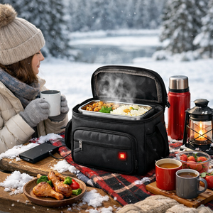 LITEGUEST USB heated lunch bag in black with red indicator, open to steaming meal; outdoor winter picnic with two mugs and lantern.