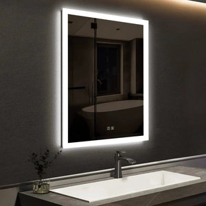 Compact Edge Glow LED bathroom mirror with edge-lit frame, wall-mounted over a sink in a dark modern bathroom.