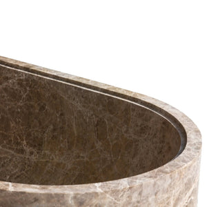 Emperador Light marble bathtub by Villohome; hand-carved solid brown marble, curved edge.