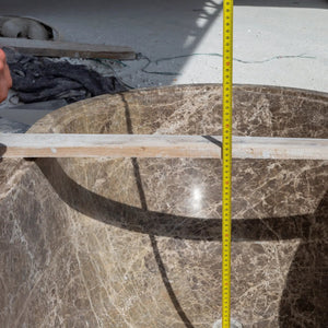 Emperador Light Marble bathtub, hand-carved from solid marble; 67 in L x 29.5 in W x 19.5 in H