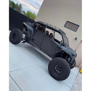 Polaris RZR XP 4 1000 UTV with black aluminum full doors, 4-seat interior, rugged off-road tires.