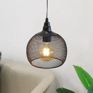 Hanging lamp round black metal cage, battery-powered with a warm bulb.