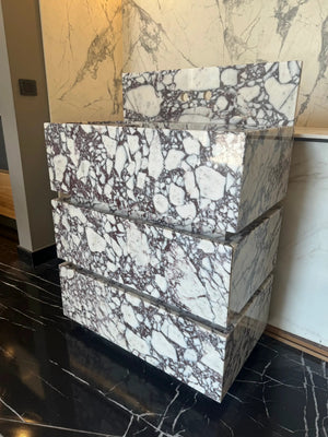 Calacatta Viola marble freestanding vanity blocks stacked, white with dark purple veining