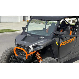 2024+ Polaris RZR XP 1000 glass windshield on a black off-road UTV with orange accents