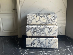 Freestanding vanity unit in Calacatta Viola marble with purple-gray veins by MEG Custom Marble