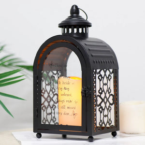 11'' high memorial lantern in black metal with glass panels and decorative lattice sides, candle inside.