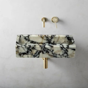 Calacatta Viola marble rectangular wall-mount bathroom sink with brass fixtures