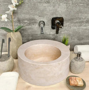Travertine above-counter bathroom sink in light beige natural stone by Villohome