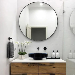Toros black marble above-counter bathroom sink, round vessel with middle drain, 16 inch diameter on white vanity