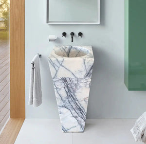 Pedestal sink cone-shaped in New York White marble by Villohome.