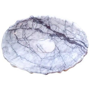 New York Marble designer vessel sink by Villohome, polished white marble with gray veining.