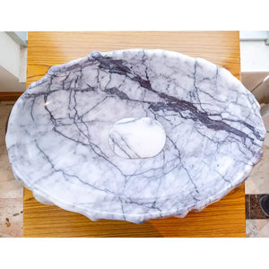 New York Marble Designer Vessel Sink by Villohome; polished white marble with gray veining
