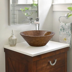 Noce brown travertine vessel sink atop a white vanity with chrome faucet in a modern bathroom.