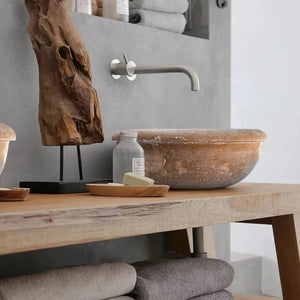 Noce Brown Travertine bathroom sink by Villohome; above-vanity stone basin on wood with wall-mounted faucet.