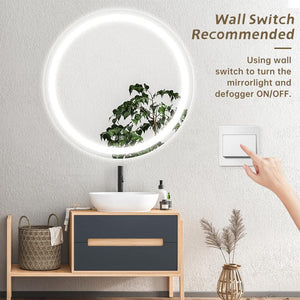 Round LED bathroom vanity mirror with dimmable white LED ring mounted above sink.