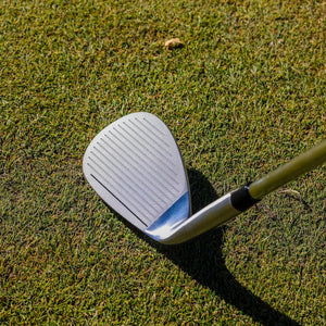 Ase Golf 3-Piece Wedge Set with two silver wedges on grass.
