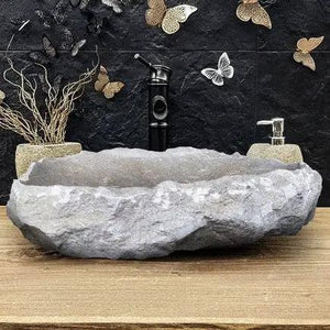 Seagrass fossil limestone bathroom vessel sink by Villohome, gray stone with polished interior and rustic exterior