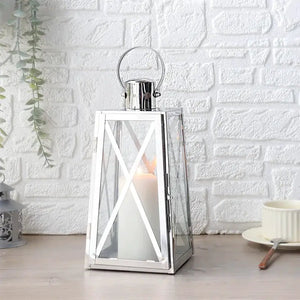 12''H JHY DESIGN stainless steel decorative lantern with trapezoid glass panels and top handle, candle inside