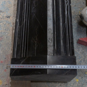 Toros black marble hand-carved fireplace mantel, polished with white veining