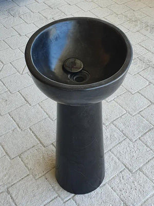 Toros black marble pedestal sink with oval basin on a tall stand; bathroom stone sink
