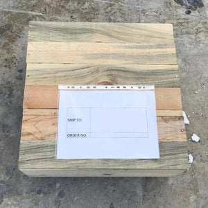 Troia Light Travertine coffee table packaging on wooden pallet with paperwork