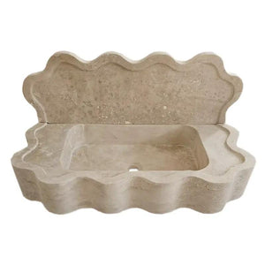 Travertine wall-mount bathroom sink by Villohome, Tuscany beige with wavy edges and 5-inch backsplash.