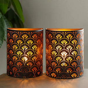 Set of 2 JHY DESIGN Flabellum battery-operated wall sconce lamps, black metal with warm orange light.