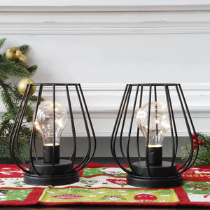 Set of 2 7-inch tall black metal battery-operated lamps with wireframe cages and clear string-light bulbs