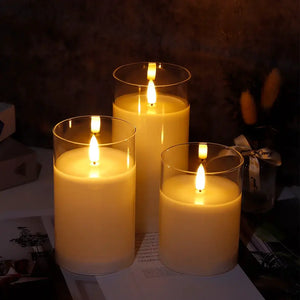 Glass Wax Flameless LED Candles set of 3 by JHY DESIGN in clear glass cylinders with warm amber glow