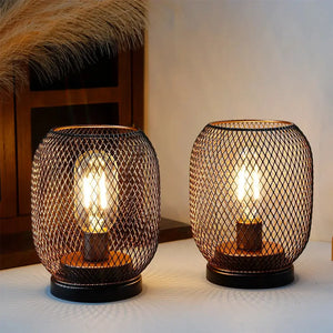 Set of 2 tall battery-powered outdoor table lamps with copper-tone wire mesh cages and warm Edison bulbs